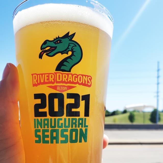 Glass of beer with River Dragons Alton logo followed by 2021 Inaugural Season